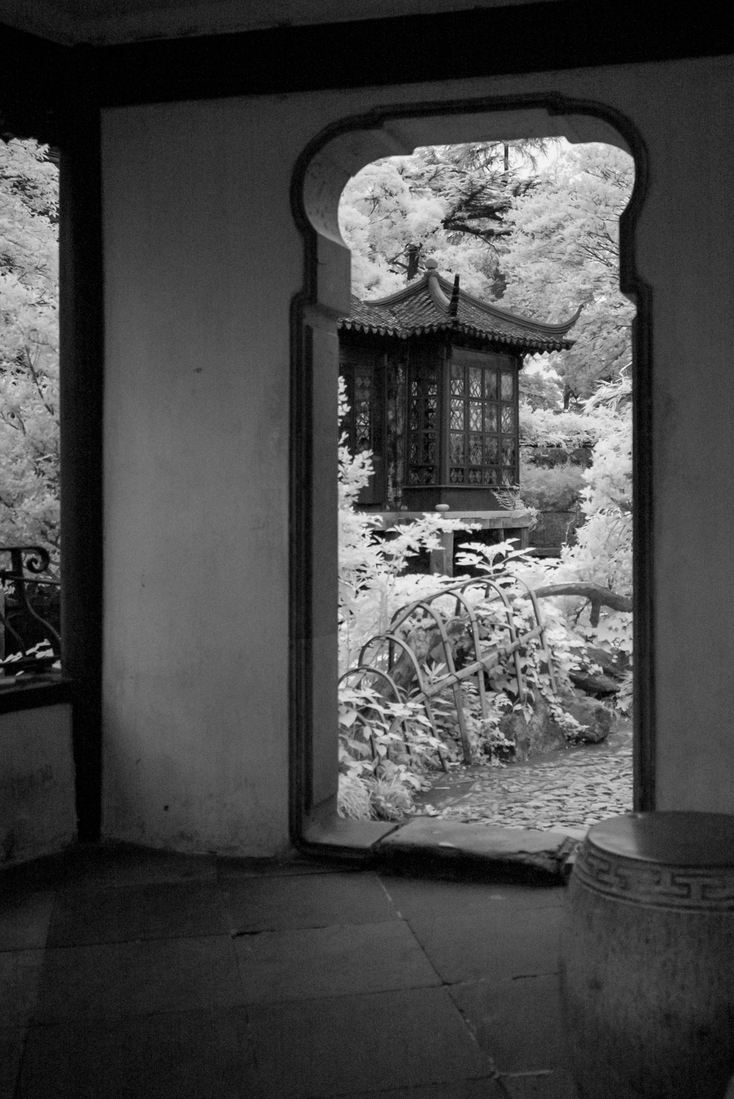 A view of the Thirty-Six Mandarin Duck Hall, framed by the Fan-Shaped Pavilion.