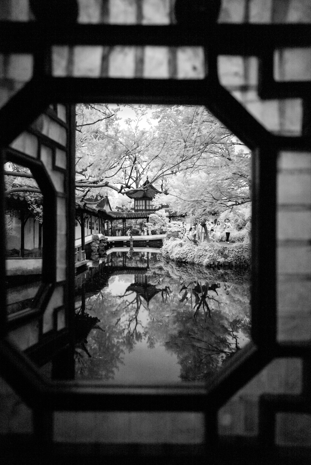 Through the window of the Liuting Pavilion, a view of the Tayin Pavilion.