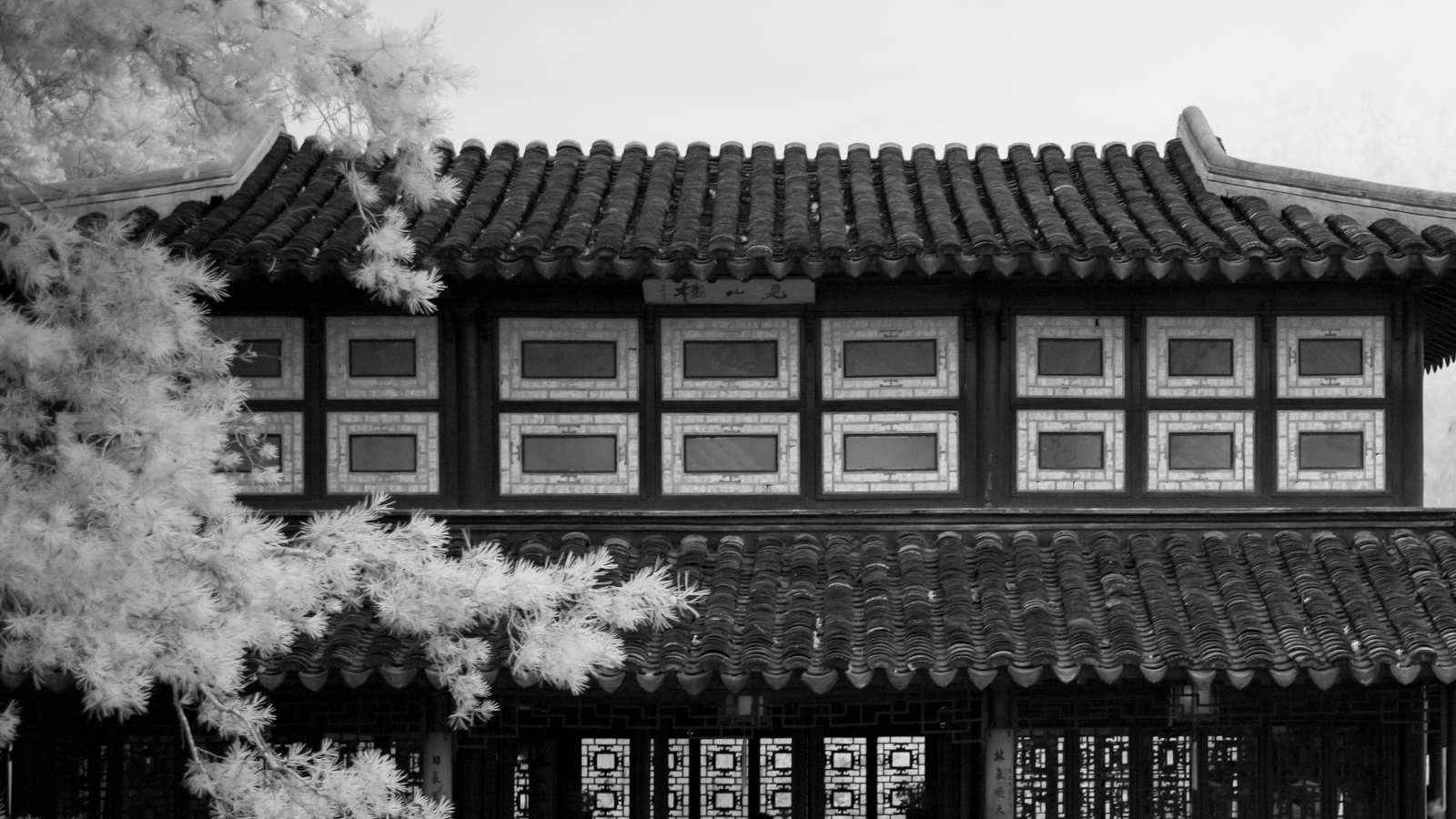 Detailed view of a latticed window at the Jianshan Tower.