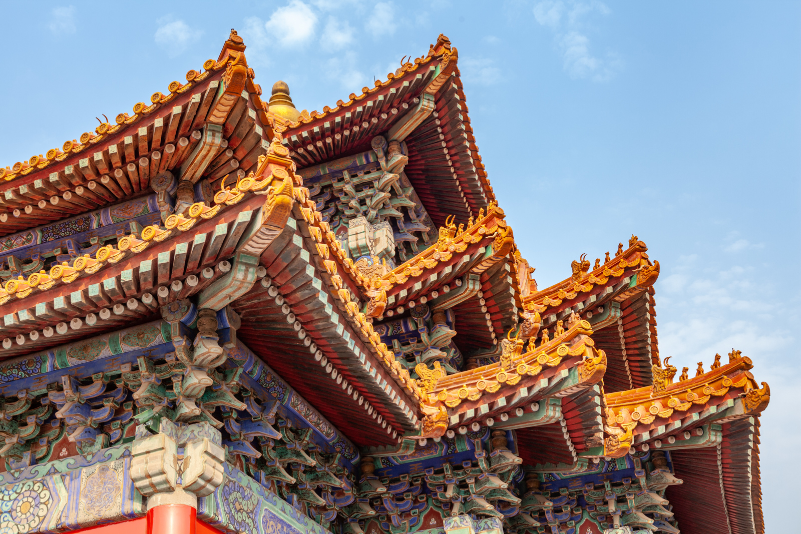 Close-up view of intricate dougong bracketing under eaves of corner tower, Forbidden City